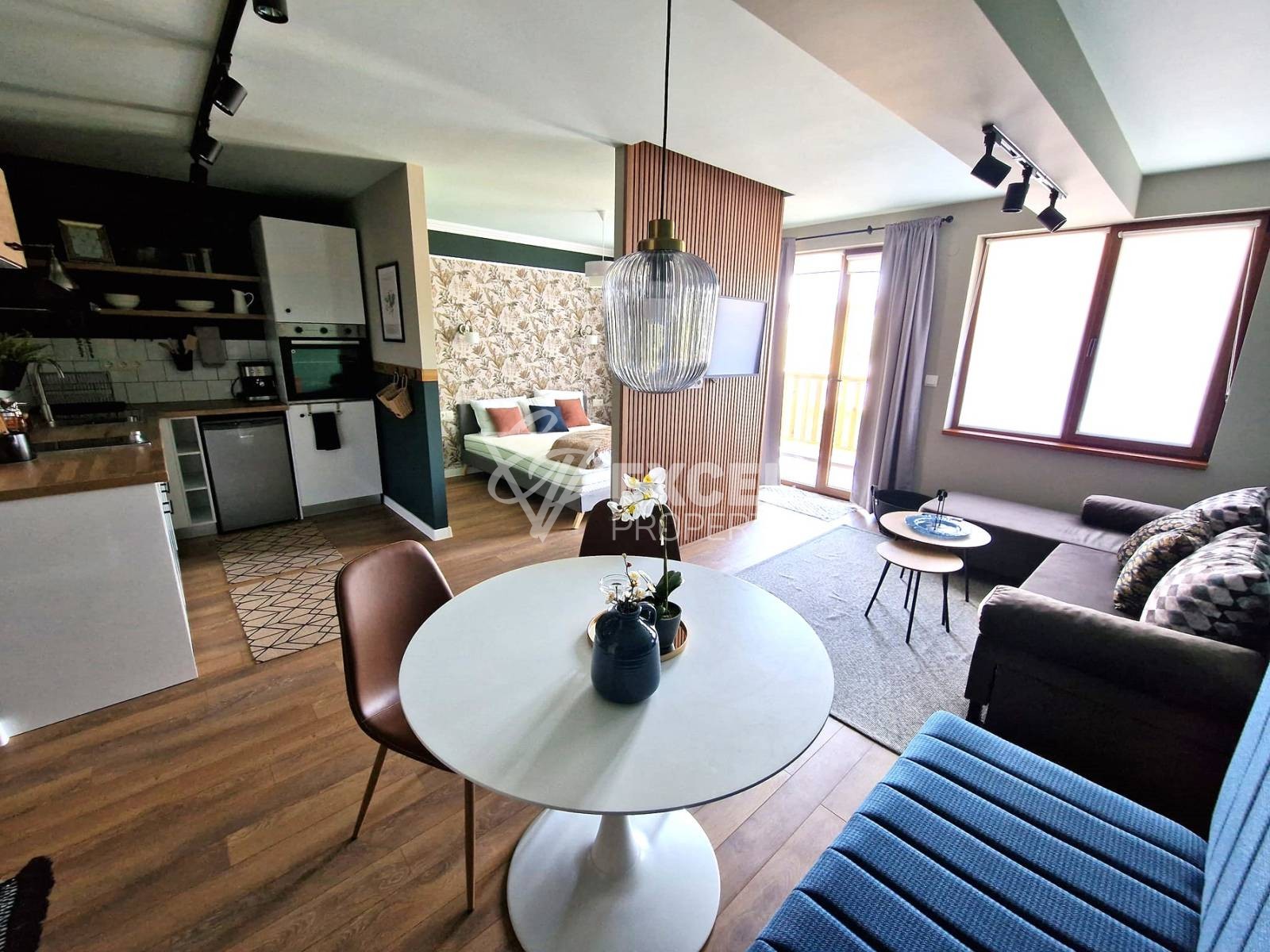 Стилно обзаведен апартамент за продажба в подножието на Пирин планина
